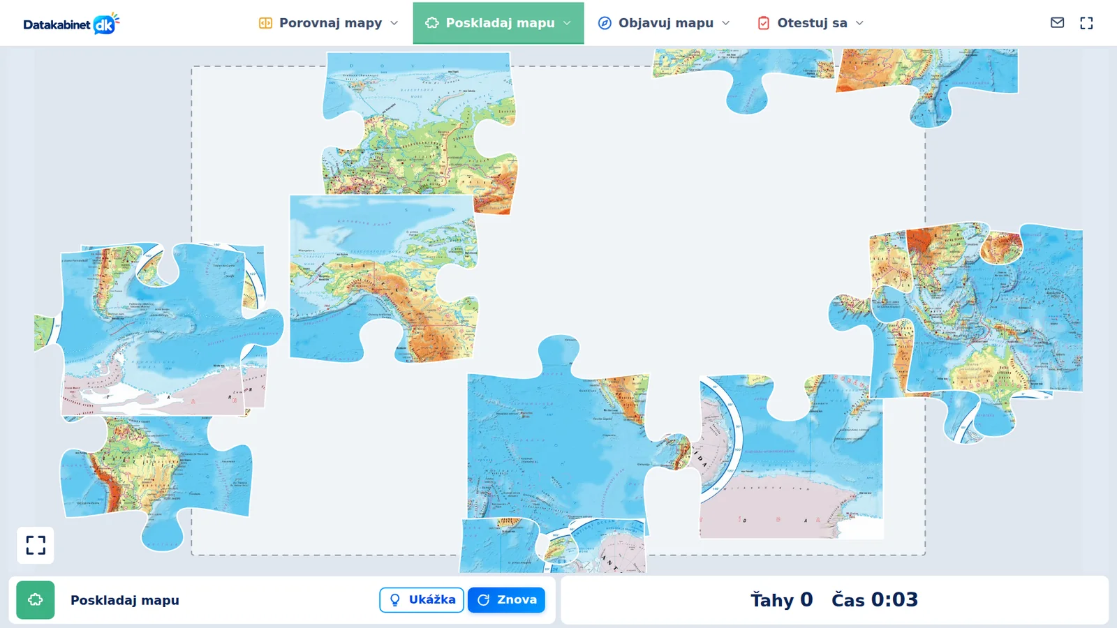 Počítač – Poskladaj puzzle, rozhádzané dieliky mapy sveta